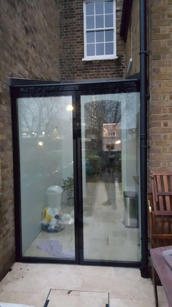 Frameless glass double doors